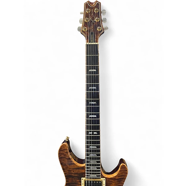 Used 2010s Peavey USA Custom Signature Series EXP tigers eye Solid Body Electric Guitar 6 Used 2010s Peavey USA Custom Signature Series EXP tigers eye Solid Body Electric Guitar